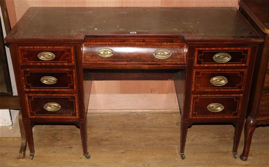 An Edwardian satinwood banded mahogany kneehole desk, W.4ft 3in. D.1ft 10in. H.2ft 7in.